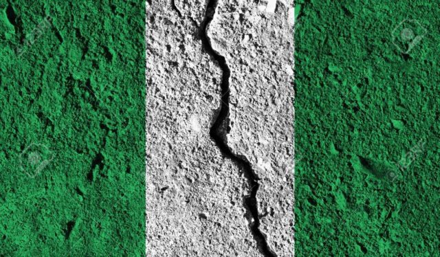 Nigeria flag with crack through the middle. Country divided concept