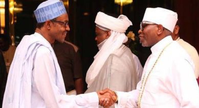Presidet Muhammadu Buhari shakes hand with President of the Christian Association of Nigeria, Ayo Oritsejafor 