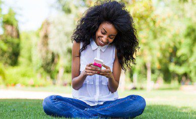 black woman using phone