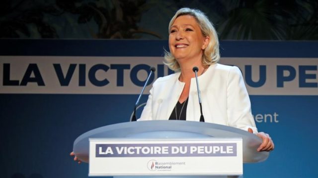 French far-right National Rally party leader Marine Le Pen reacts after the first results of the EU elections are announced in Paris on May 26, 2019 [Reuters/Charles Platiau]
