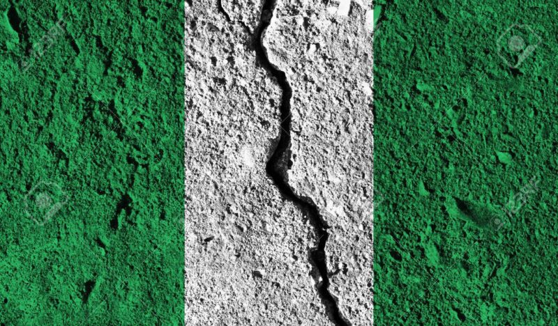 Nigeria flag with crack through the middle. Country divided concept