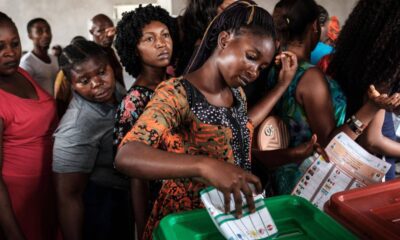 Vote and democracy in Nigeria - 2022-06-29-woman-casts-ballot-nigeria