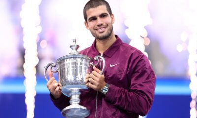 Spain's Carlos Alcaraz poses with his trophy after winning the men's singles final tennis match against Italy's Jannik Sinner on day fifteen of the US Open tennis tournament at the USTA Billie Jean King National Tennis Center in New York City on September 7, 2025. (Photo by CHARLY TRIBALLEAU / AFP)
