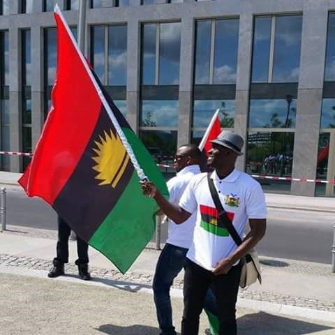 Two Biafran with flags