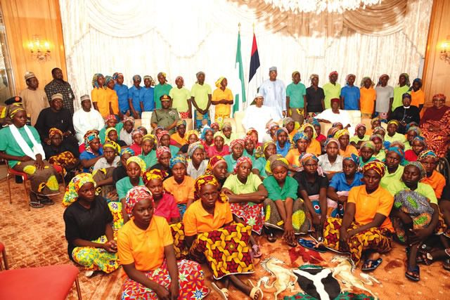 Some of the 82 freed Chibok girls when President Muhammadu Buhari received them at the Presidential Villa Abuja ... on Sunday