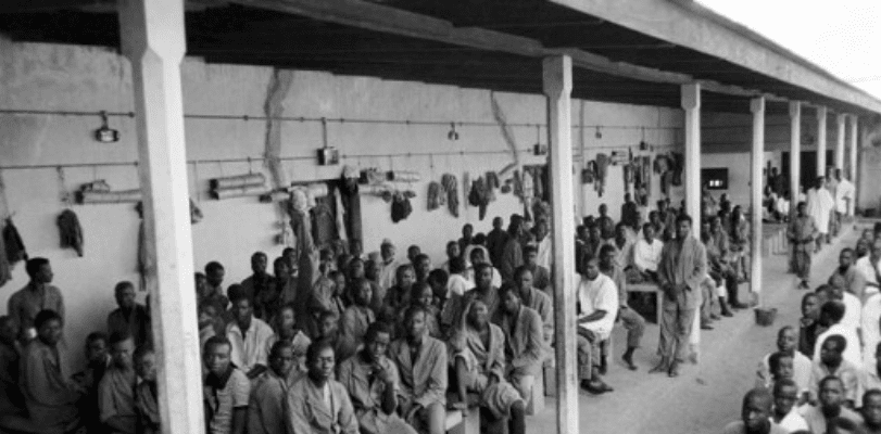 Biafran prisoners and civilians wait at the federal camp of Nakurdi