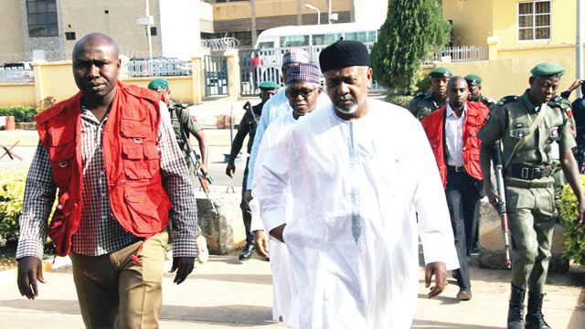 Dasuki with law enforcement operatives
