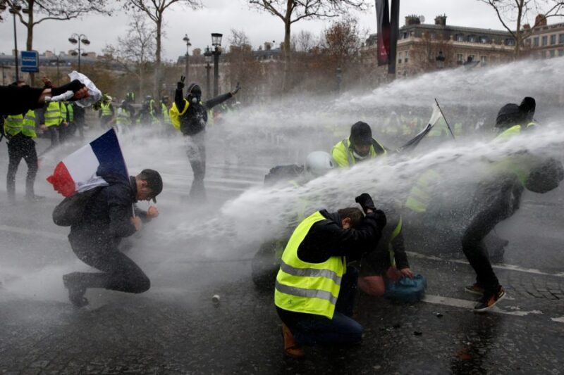 paris protests yellow vests e1544243024397