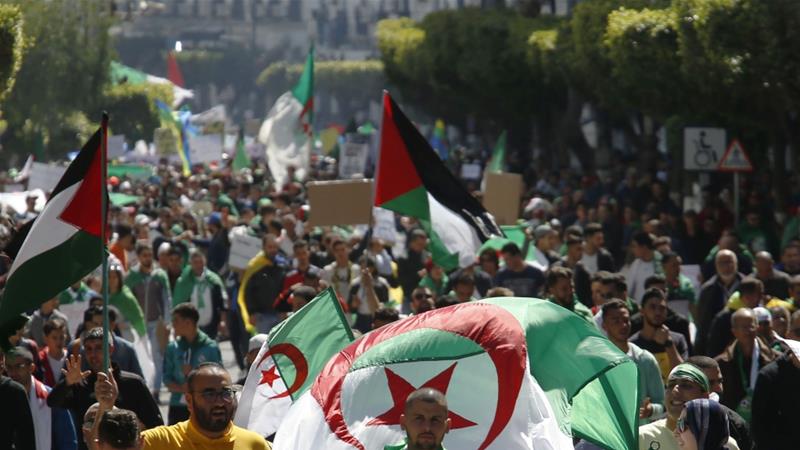 Algerian demonstrators march during a protest in Algiers on