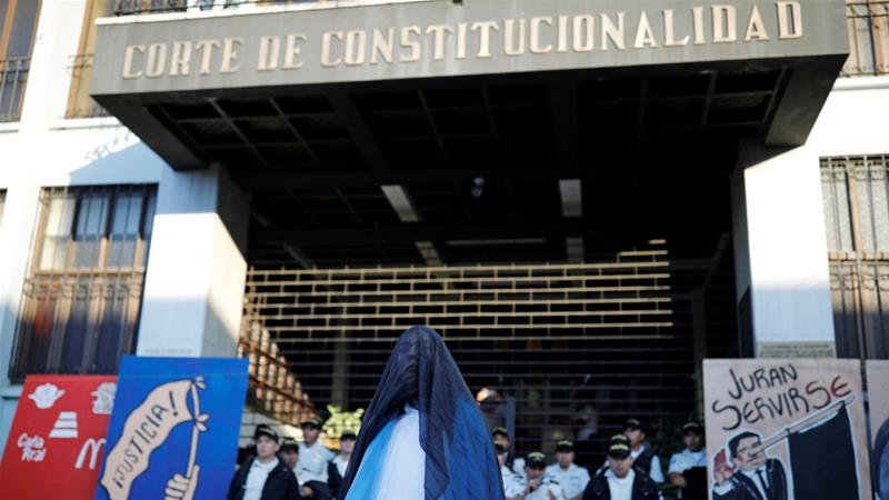 Demonstrators protest against President Jimmy Moraless decision to end the mandate of the UN anti corruption commission CICIG in Guatemala City January 12 2019