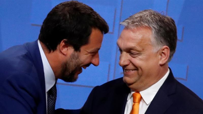 Italian Deputy Prime Minister Matteo Salvini smiles with Hungarian Prime Minister Viktor Orban during a joint news conference in Budapest Hungary