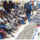 Suspected kidnappers armed robbers gun runners and dealers of illegal weapons from Libya and Chad being paraded by the Nigeria Police Force at the SARS office in Abuja