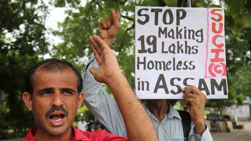 Activists of the Socialist Unity Centre of India protest against the final draft of the National Register of Citizens of Assam in Ahmedabad