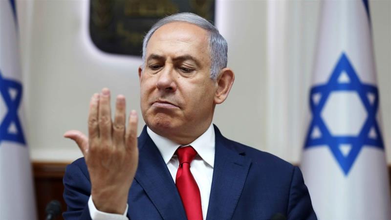 Israeli Prime Minister Benjamin Netanyahu gestures during the weekly cabinet meeting at his office in Jerusalem