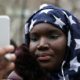 Muslim Senegalese American Fatou Goumbala takes part in a World Hijab Day rally held in front of New York City Hall in Manhattan, New York, US, February 1, 2018 [Amr Alfiky/Reuters]