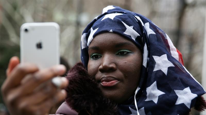 Muslim Senegalese American Fatou Goumbala takes part in a World Hijab Day rally held in front of New York City Hall in Manhattan, New York, US, February 1, 2018 [Amr Alfiky/Reuters]