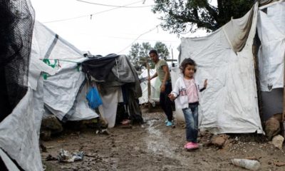 A girl at a makeshift camp for refugees and migrants beside the Moria camp on the island of Lesbos