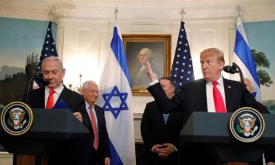 US President Donald Trump gestures as he and Israels Prime Minister Benjamin Netanyahu
