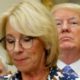 US President Trump and Vice President Pence wait as Education Secretary DeVos speaks to students at an event at the White House, May 3, 2017 [File: Jonathan Ernst/Reuters]