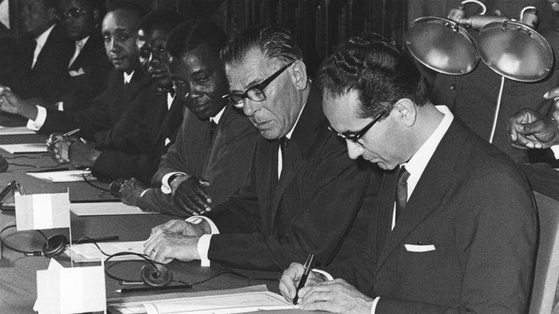 European politicians Emilio Colombo and Eugene Schaus Togos trade minister Jean Agbemegnan and others at the signing of the Youande Convention on July 20 1963