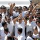 Sri Lankas President Gotabaya Rajapaksa waves at his supporters as he leaves after the presidential swearing in ceremony in Anuradhapura Sri Lanka