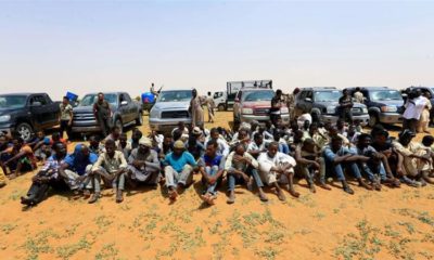 Irregular migrants wait to be transported after being arrested by Sudans paramilitary Rapid Support Forces RSF on the Khartoum State border Sudan