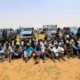 Irregular migrants wait to be transported after being arrested by Sudans paramilitary Rapid Support Forces RSF on the Khartoum State border Sudan
