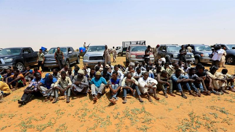 Irregular migrants wait to be transported after being arrested by Sudans paramilitary Rapid Support Forces RSF on the Khartoum State border Sudan