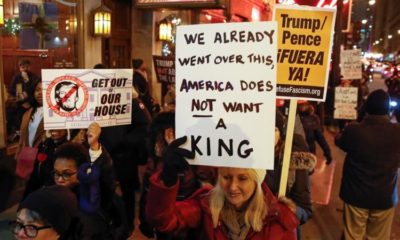 Protesters take part in a rally to support the impeachment and removal of US President Donald Trump in Chicago