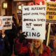 Protesters take part in a rally to support the impeachment and removal of US President Donald Trump in Chicago