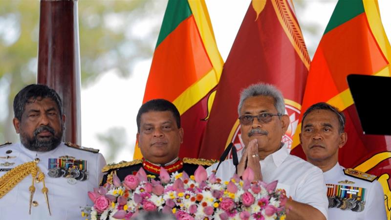 Sri Lankas President Gotabaya Rajapaksa gestures while addressing the nation at the presidential swearing in ceremony in Anuradhapura on November 18