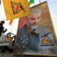 A picture of the Iranian General Qassem Soleimani is seen at the funeral of the Iraqi militia commander Abu Mahdi al Muhandis who was killed with him in Baghdad on January 3 1