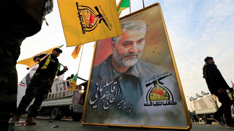 A picture of the Iranian General Qassem Soleimani is seen at the funeral of the Iraqi militia commander Abu Mahdi al Muhandis who was killed with him in Baghdad on January 3