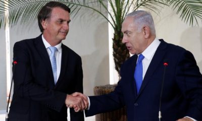 Brazils President Jair Bolsonaro greets Israeli Prime Minister Benjamin Netanyahu during a meeting in Rio de Janeiro Brazil December 28 2018