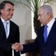 Brazils President Jair Bolsonaro greets Israeli Prime Minister Benjamin Netanyahu during a meeting in Rio de Janeiro Brazil December 28 2018