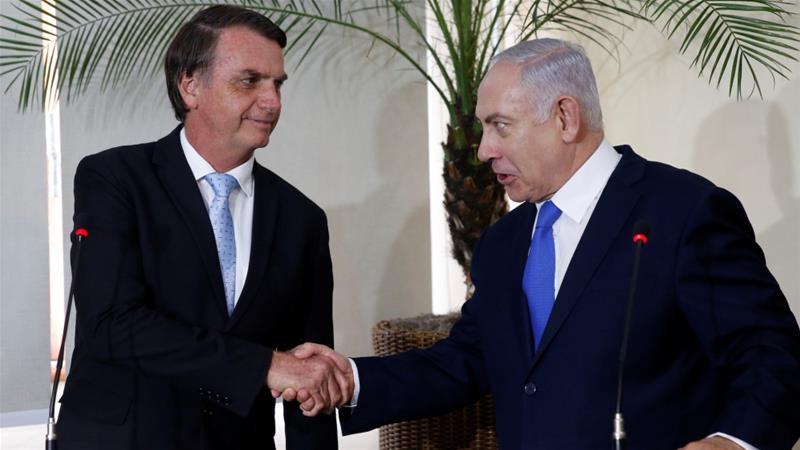 Brazils President Jair Bolsonaro greets Israeli Prime Minister Benjamin Netanyahu during a meeting in Rio de Janeiro Brazil December 28 2018