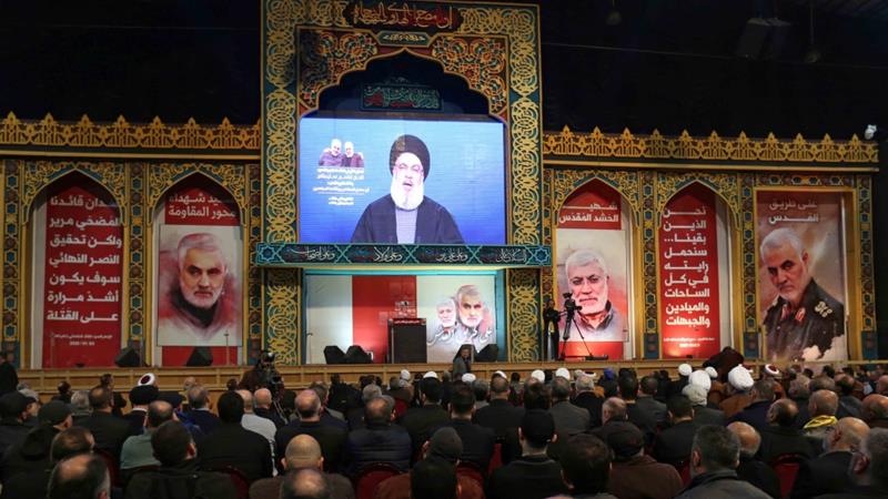 Lebanons Hezbollah leader Hassan Nasrallah addresses a funeral ceremony to mourn Iranian Major General Qassem Soleimani in Beiruts suburbs on January 5 2020