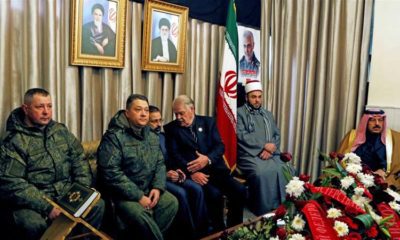 Russian military personnel attend a memorial service for the late Iranian General Qassem Soleimani at the Iranian embassy in Damascus on January 5 2020