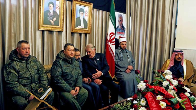 Russian military personnel attend a memorial service for the late Iranian General Qassem Soleimani at the Iranian embassy in Damascus on January 5 2020