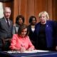 US House Speaker Nancy Pelosi signs the two articles of impeachment of US President Donald Trump before sending them over to the Senate on January 15 2020