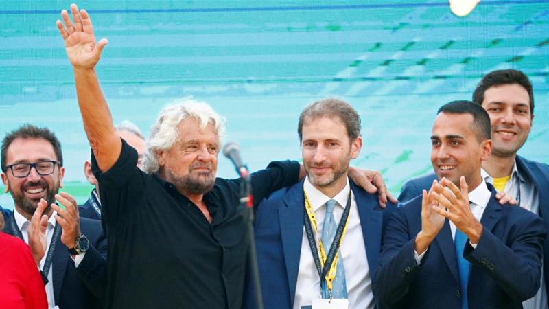 Co founder Beppe Grillo Davide Casaleggio son of co founder Gianroberto Casaleggio and Italian Deputy PM Luigi Di seen at a Five Star Movement party rally in October 2018