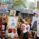 Palestinians hold pictures of relatives held in Israeli jails during a rally marking Palestinian Prisoner Day in the West Bank city of Nablus on April 16 2017