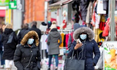 Pedestrians walk in the Chinatown district of downtown Toronto Ontario on January 28 2020. Three patients with novel coronavirus have been reported in Canada