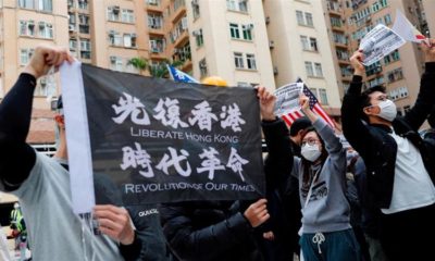 People march to protest against the governments plan to set up a quarantine site close to their community amid the Wuhan coronavirus outbreak in Hong Kong China Feb 2 2020