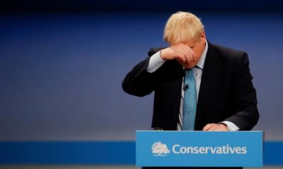 UK Prime Minister Boris Johnson reacts as he gives a closing speech at the Conservative Party annual conference in Manchester Britain October 2 2019
