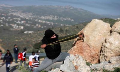 A Palestinians protest illegal Israeli settlements near the town of Beita in the Israeli occupied West Bank on March 11 2020