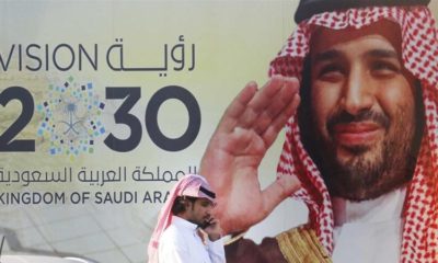 A banner advertises Saudi Crown Prince Mohammed bin Salmans Vision 2030 outside a mall in Jeddah Saudi Arabia on February 5 2020