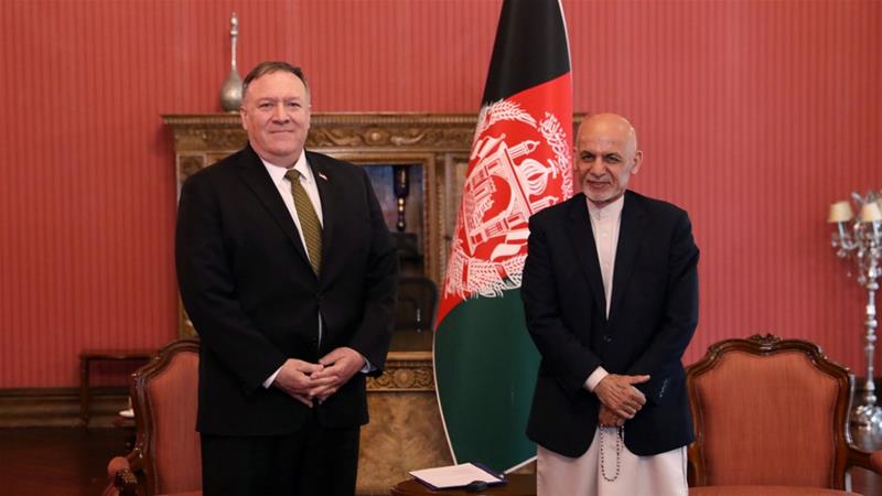 Afghanistans President Ashraf Ghani R and U.S. Secretary of State Mike Pompeo pose for a photo during their meeting in Kabul Afghanistan on March 23 2020