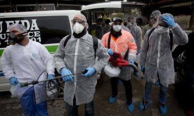 Palestinian workers get ready to disinfect mosques and churches as a preventive measure against the coronavirus in Ramallah in the occupied West Bank on March 7 2020