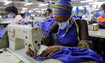 Factory workers begin the production of personal protective gear for local frontline health workers commissioned by the Ghanian government in Accra on April 10 2020